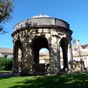 Le cloître Saint-Jean est situé à l'emplacement de l'ancienne cour du palais du cardinal Aubert. Après qu'il eut été détruit par un incendie, le petit neveu d'Aubert y installe douze cellules de moines. Le centre du cloître est occupé par une fontaine qui distribuait en eau l'ensemble de la chartreuse. Depuis le bassin de la fontaine, une canalisation alimentait, en sous-sol, le cloître des morts, la cour du sacristain et le quartier des convers. Le bassin, couvert d'un édicule de la fin du XVIIIe siècle, date du XVIIe siècle. 