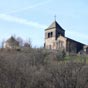 Dominant la vallée de la rivière Couze Pavin, se dresse la colline du Chastel. C'est là que les hommes du néolitique vinrent s'installer, suivis des celtes, des gallo-romains, puis des premiers chrétiens. Le haut de la butte fut de tout temps considéré comme sacré, et c'est là que les hommes construisirent leur sanctuaire.